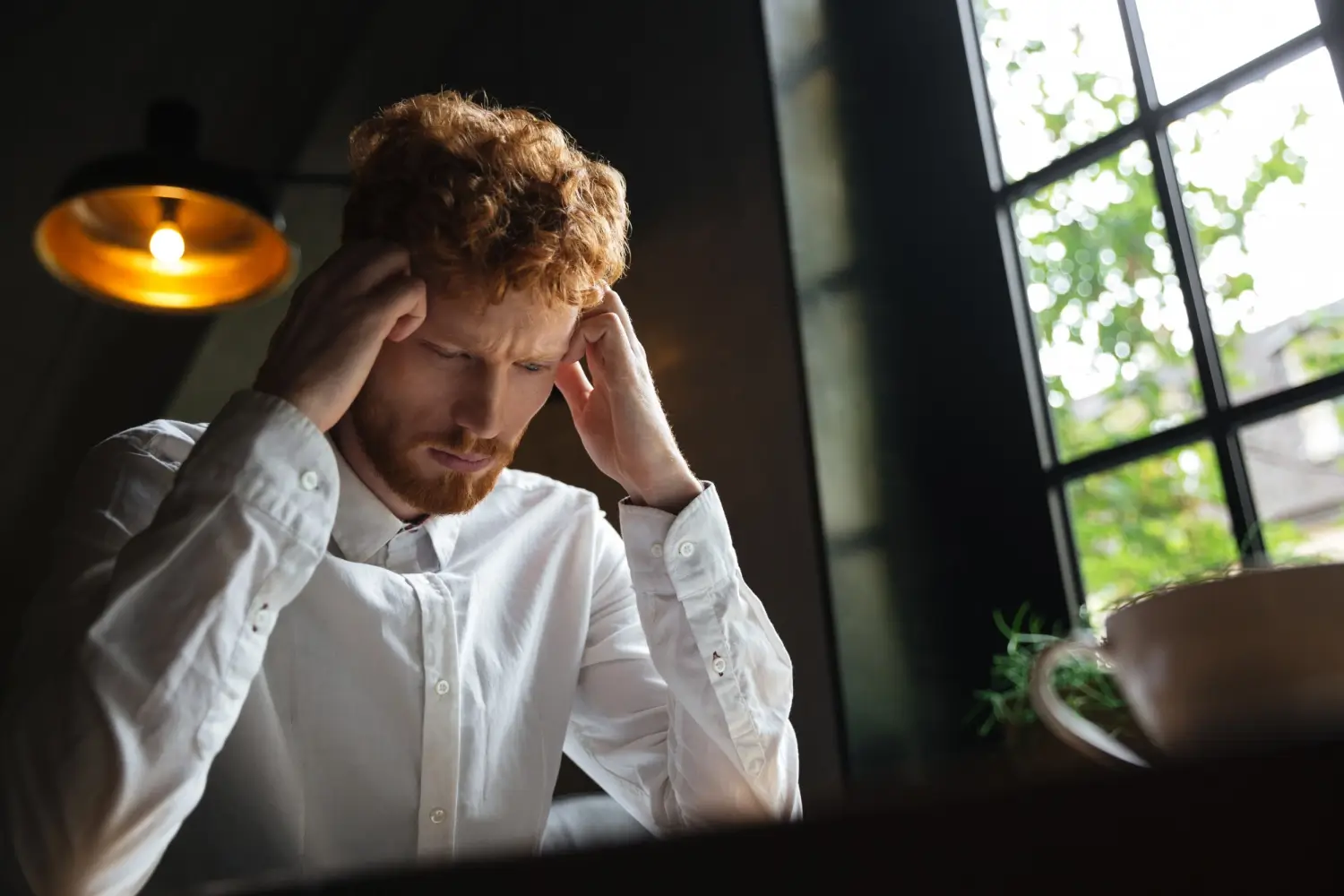 Adult male experiencing ADHD inattention and hyperactivity symptoms Chicago Illinois